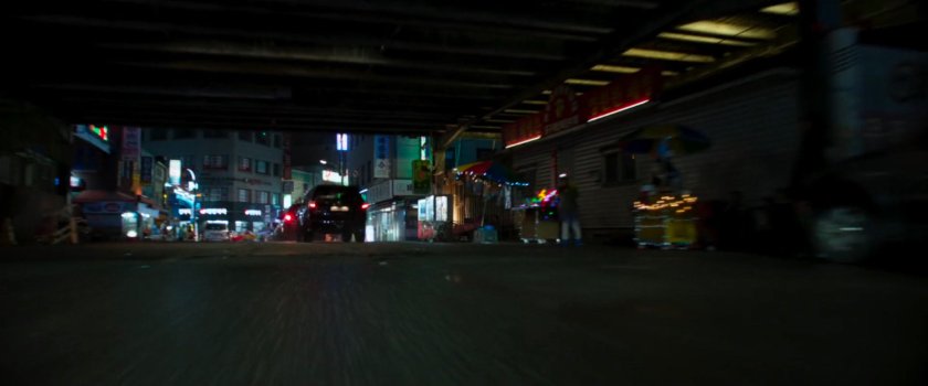 SUVs driving on a Busan street.