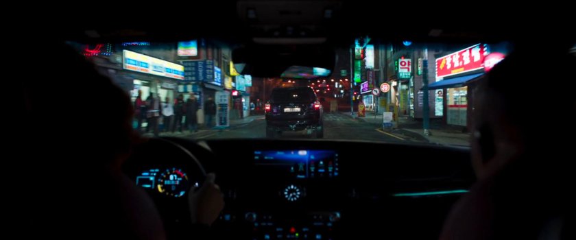POV from inside an SUV driving on a Busan street.