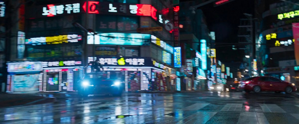 Black Panther on top of car in a Busan intersection.