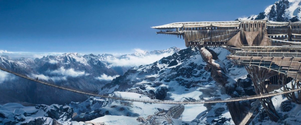A wooden structure extends from a snow covered mountain in Jabariland.