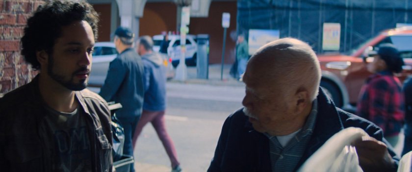 Unique and Mr. Nakajima in an alley.