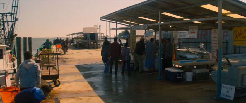 People at the Wilson Family Seafood pier.