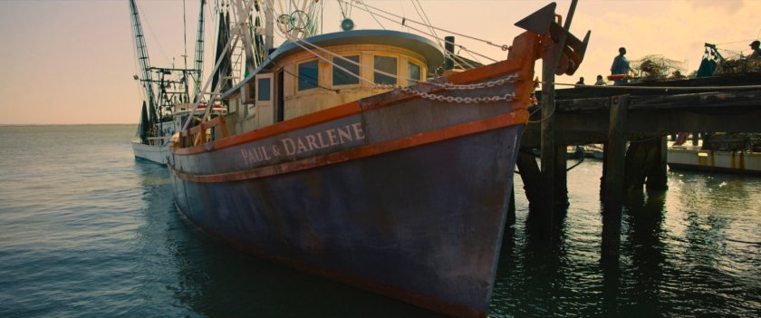The boat "Paul & Darlene" parked at a pier in Louisiana.