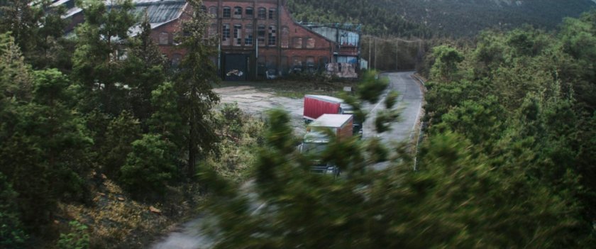 Trucks leaving  abandoned warehouse in Munich, Germany.