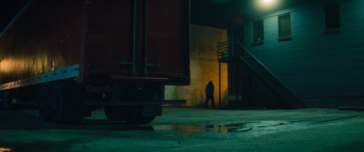 Dark alley behind German safehouse.