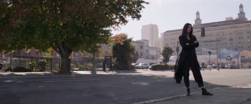 Hope standing impatiently on San Francisco sidewalk.