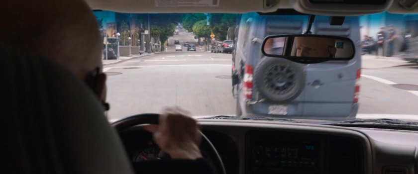 POV of SUV chasing van on San Francisco street.