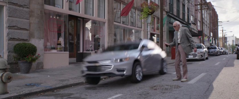 Stan Lee cameos next to a shrinking car.