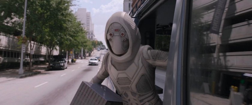 The Ghost stepping out of van with miniature Pym Lab.