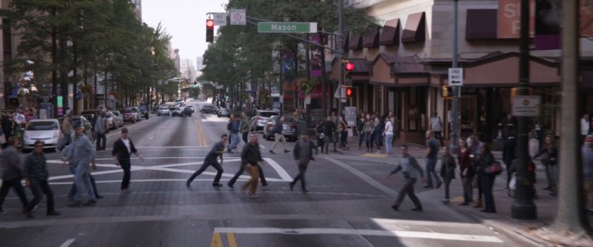 Pedestrians at a busy San Francisco intersection.