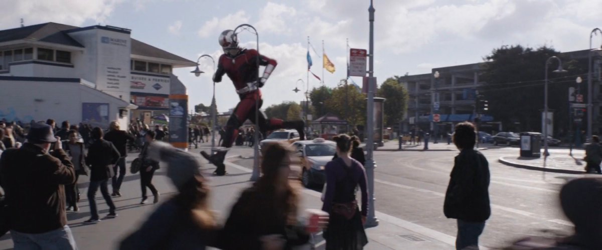 Giant-Man strides across a crowded Embarcadero.