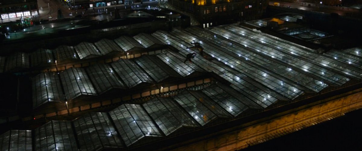 Nighttime aerial view of glass roof of Train Station.