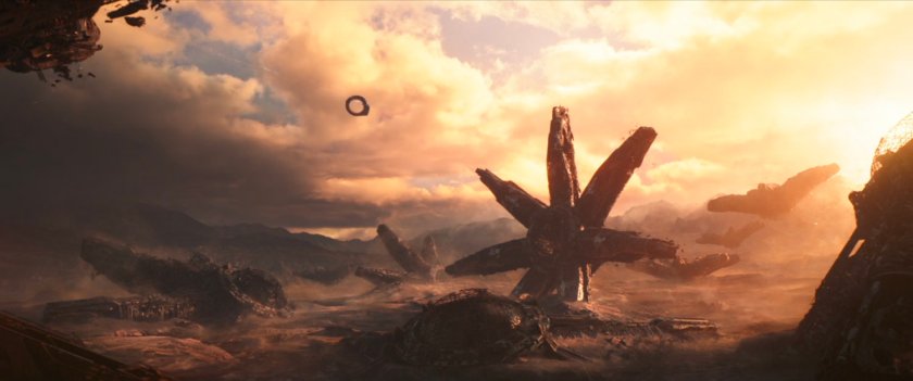 Strange multi-armed structures on the surface of dirty brown planet.