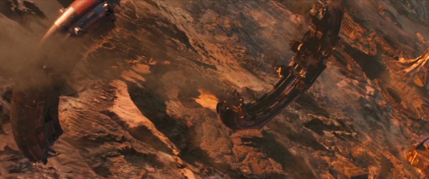 A broken Q-ship crashing through the atmosphere towards an alien planet.