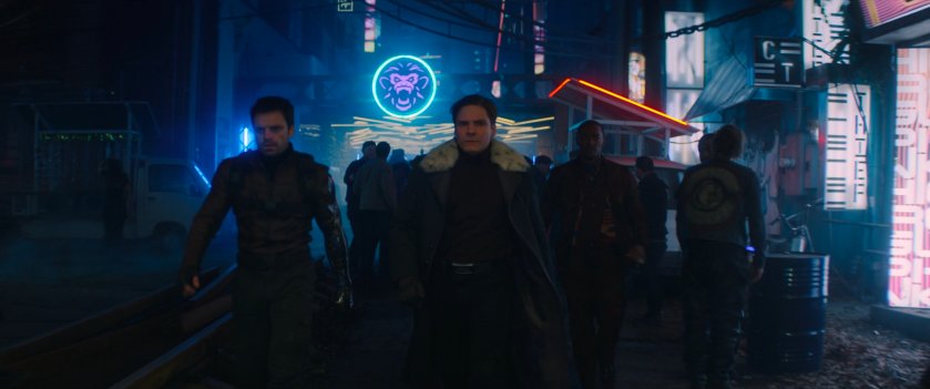 Bucky, Zemo and Sam walk through low-town in Madripoor.