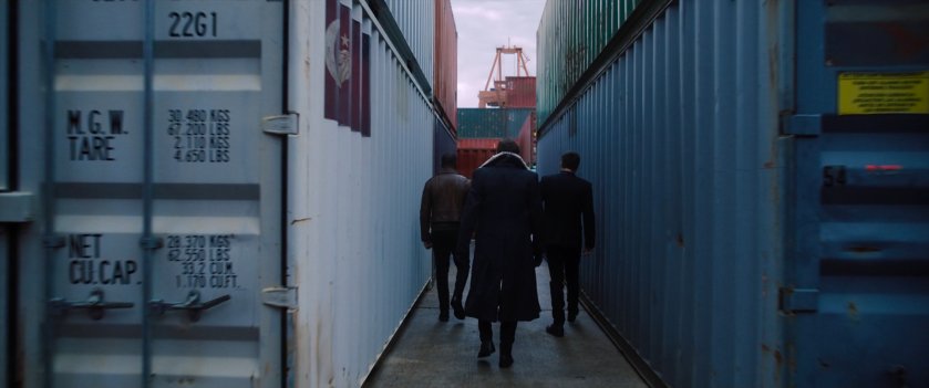 Sam, Bucky, and Zemo in Madripoor container yard.