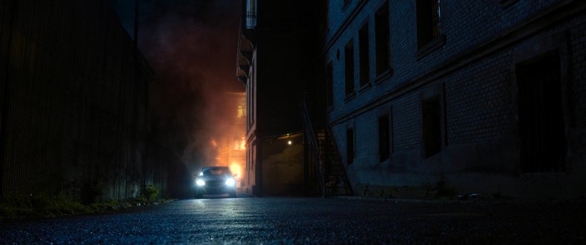 Car driving behind GRC Supply Depot.