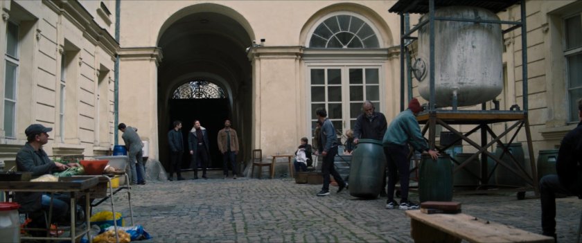 Zemo, Sam and Bucky in courtyard of GRC Resettlement Camp.