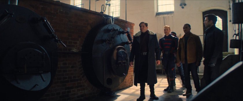 Sam, Zemo, John and Bucky in an old Latvian factory.