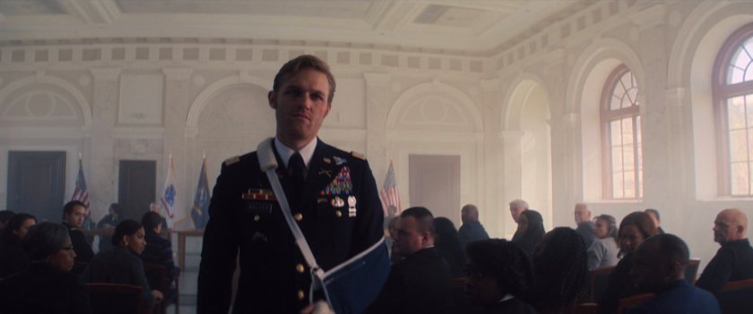 John Walker leaves a Senate committee.