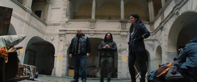 Some Flag Smashers in an empty courtyard.