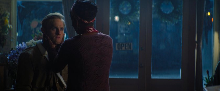 John and Mrs Hoskins inside Hoskin's flowers at night.