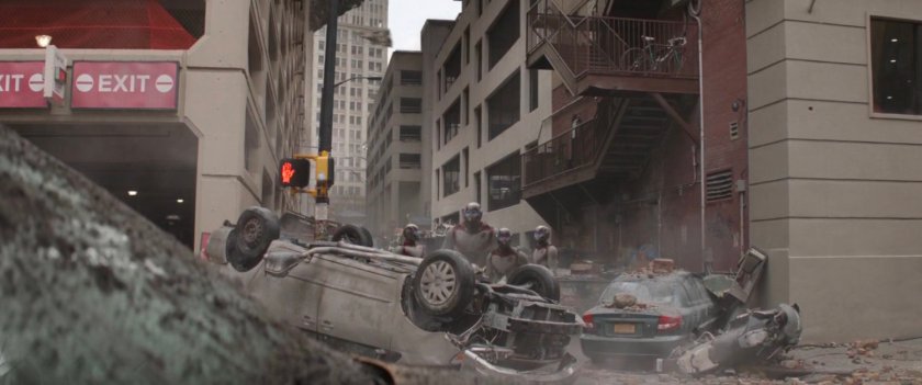 A rubble strewn street and alley in New York.
