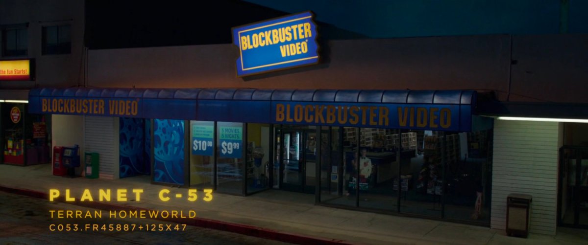Exterior of Blockbuster Video. Text: Planet C-53 Terran Homeworld.