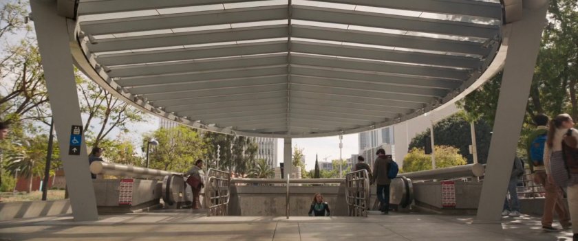 Vers ascends stairs out of Los Angeles Metro station.