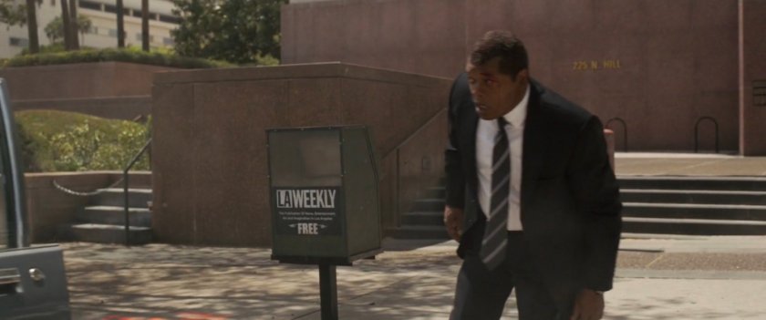 Nick Fury looking stunned near Los Angeles building.