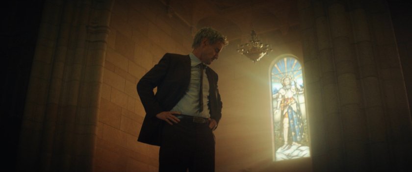 Mobius inside French Church with stained glass.