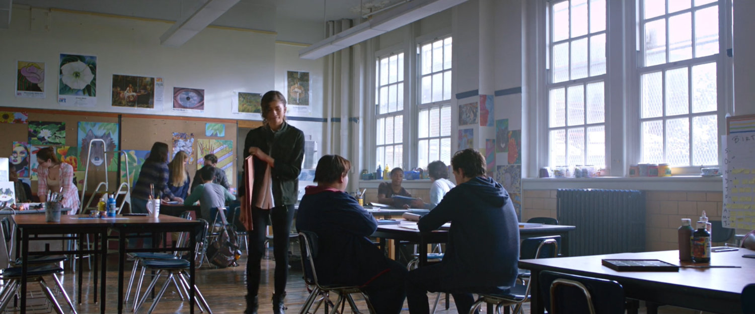 Michelle and students inside a Midtown High classroom.