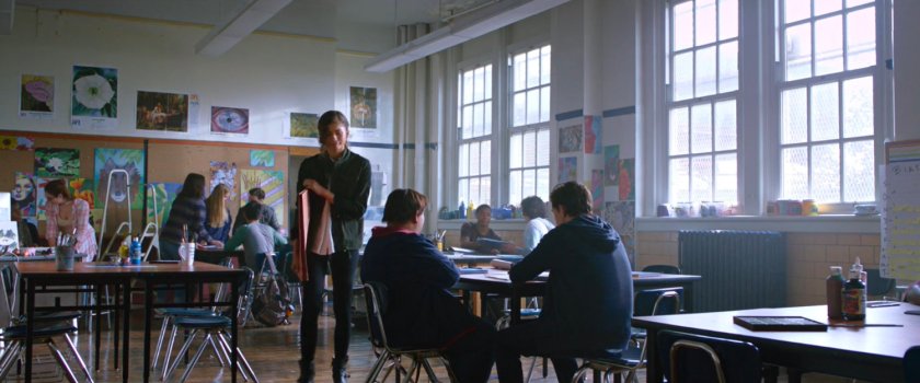 Michelle and students inside a Midtown High classroom.