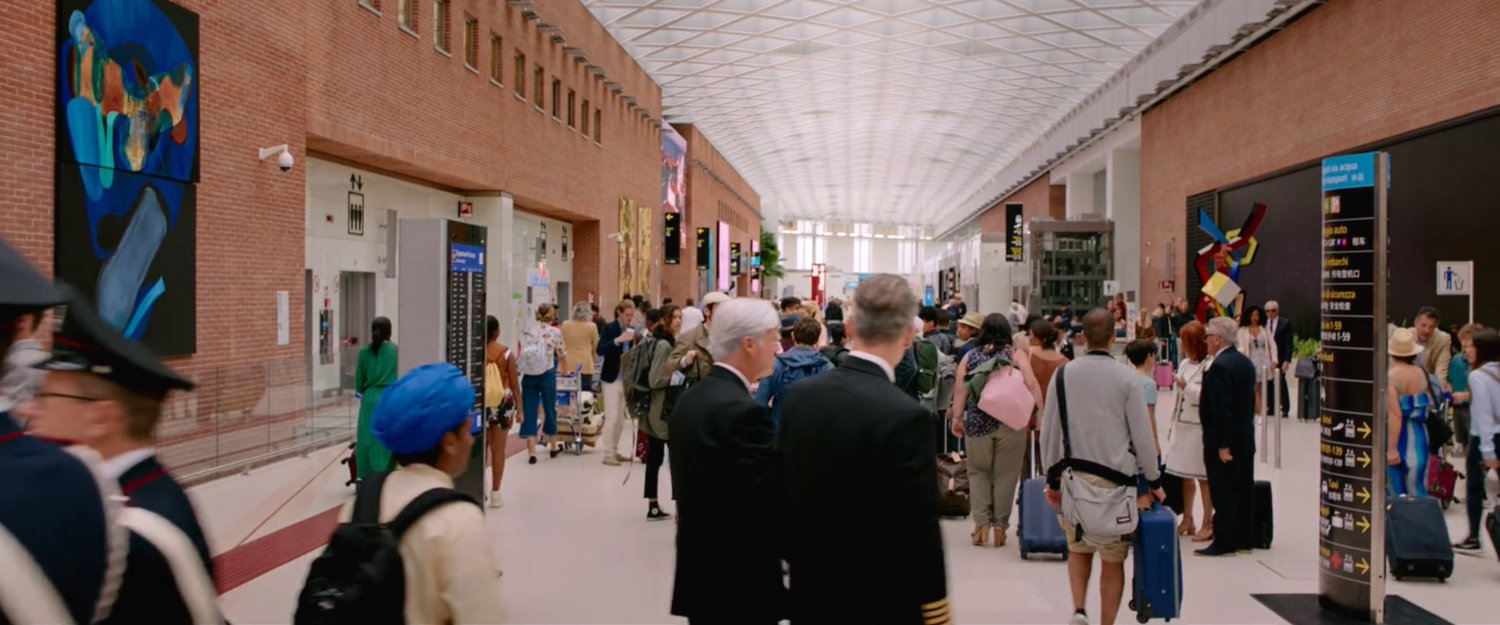 Crowds in the Venice airport terminal.