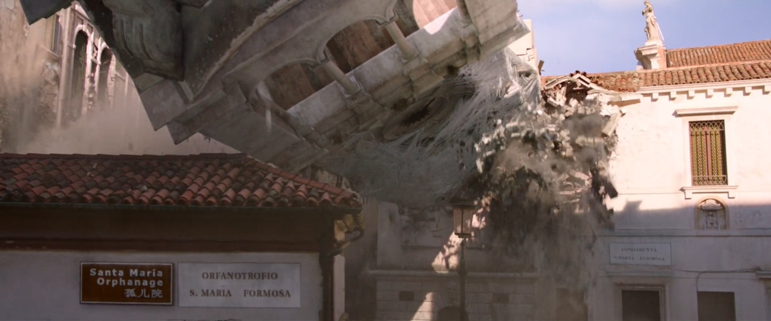 Tower falls onto the roof of an orphanage, narrowly stopping in time.