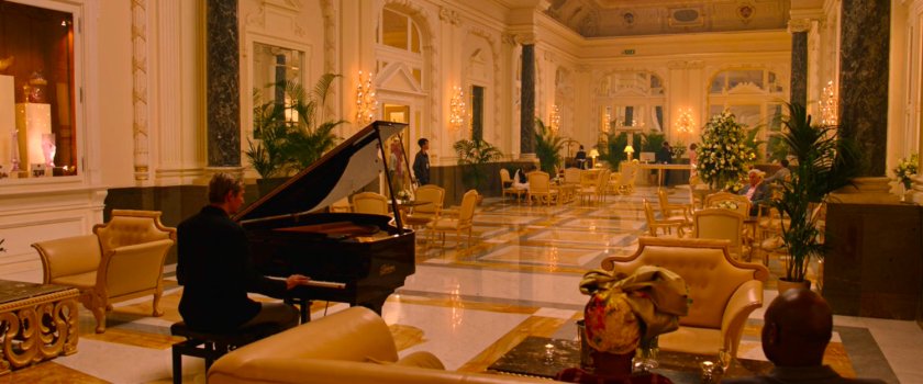 Interior lobby of Carlo IV hotel in Prague, with piano.