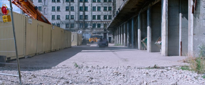 A dirty loading dock area outside a Berlin warehouse.