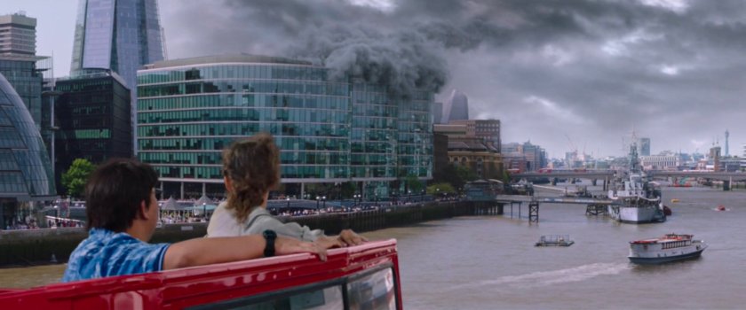 Ned and Michelle standing on top of double decker bus looking at smoke elemental descending towards Thames river.