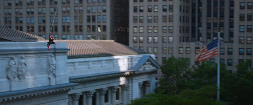 Spider-Man with Michelle swing towards New York Library.