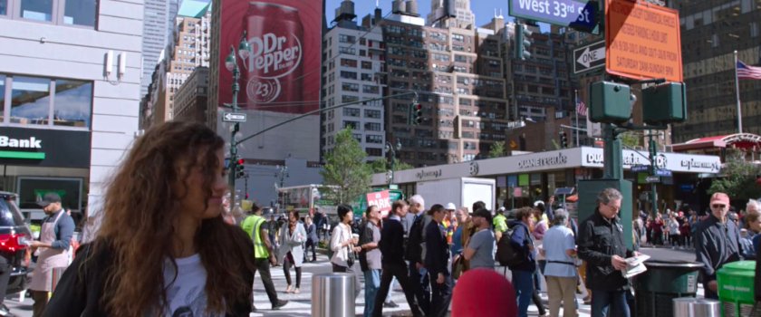 Michelle on a crowded street corner in New York.