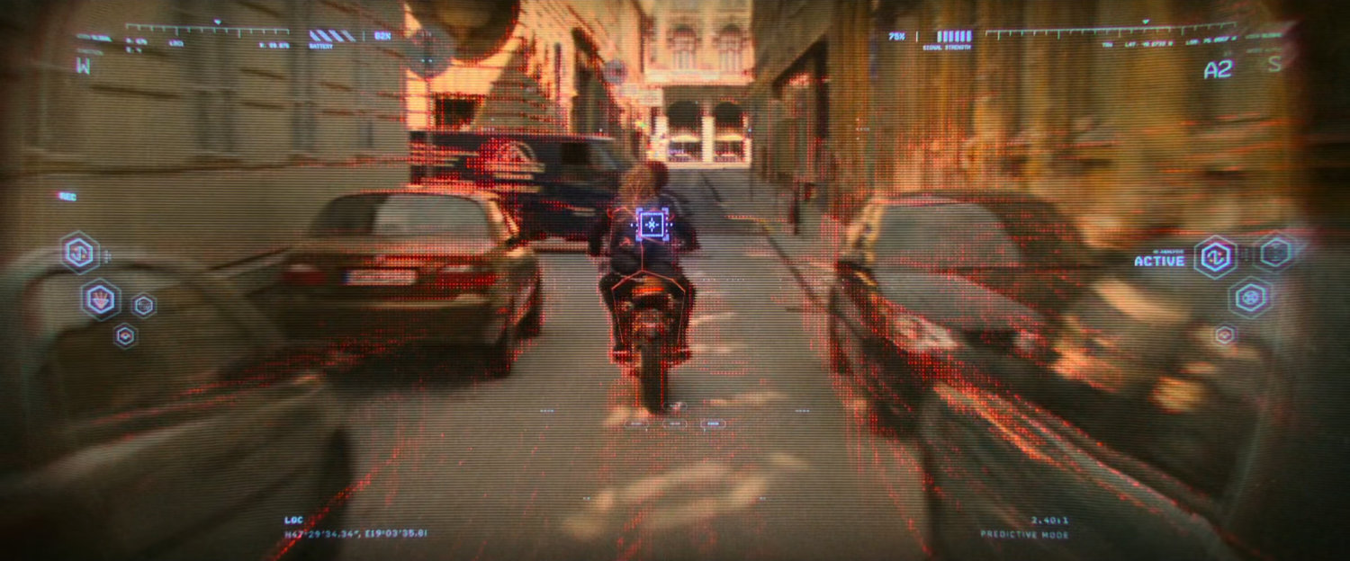 Digitally enhanced POV of motorcycle speeding down alley.