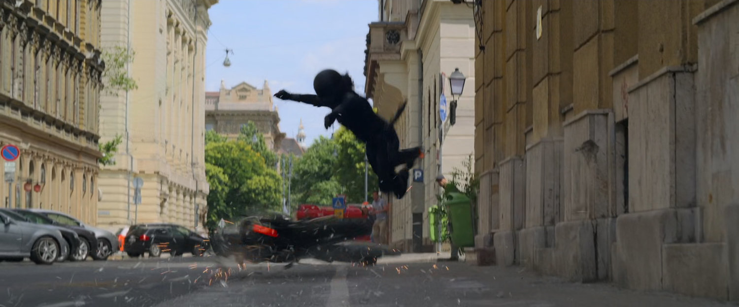A rider is thrown from their motorcycle onto a Budapest street.