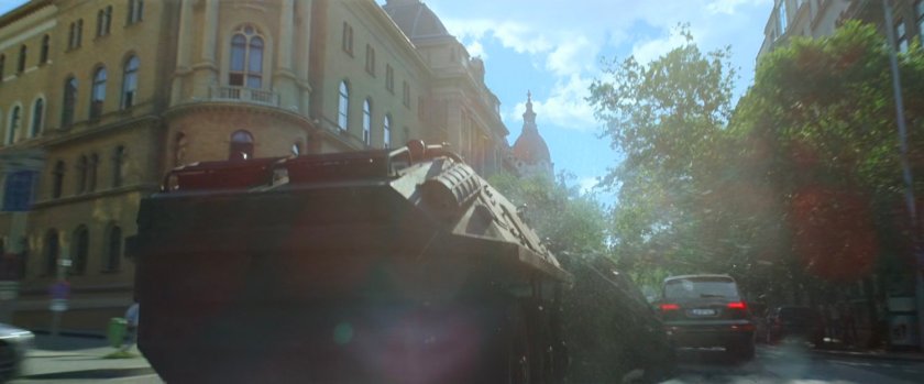 An APC crashes through cars on a Budapest street.