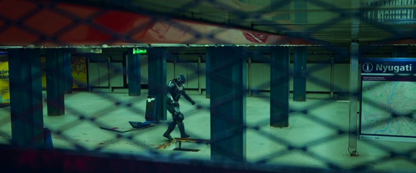 View of Taskmaster in Budapest subway from POV in vent grate.