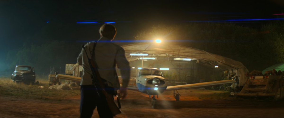 Alexei standing in front of Cessna at a small airfield.