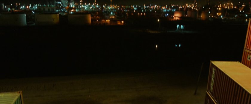 View of industrial center over shipping containers.