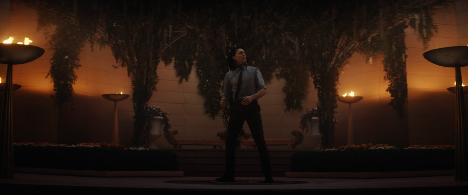 Loki in a time loop of Asgard courtyard.