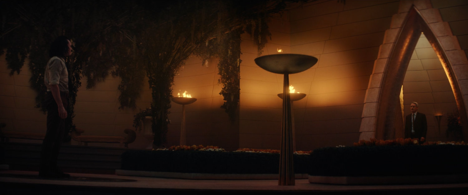Loki in a time loop of Asgard courtyard.