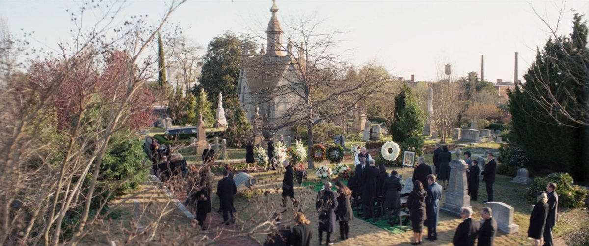 High angle of funeral service at a cemetery.