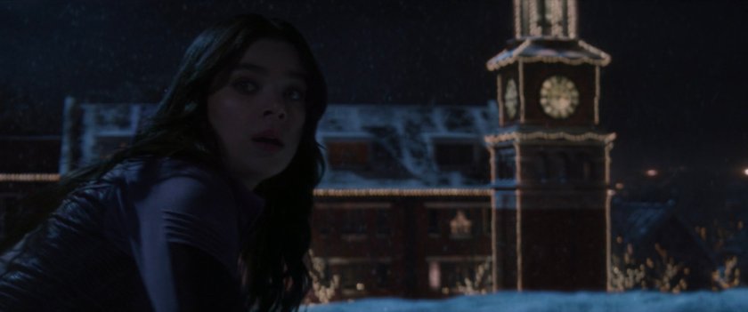 Kate on Stane Tower rooftop with bell tower in background.